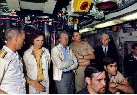 President Jimmy Carter and Admiral J. Hyman Rickover, USN (far right) aboard the USS Los Angeles in 1977.