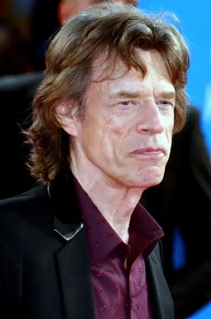 Rolling Stones vocalist M. Jagger claims that aliens have "uploaded" something into him