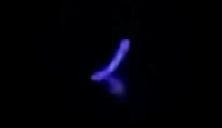 Blue ufo Oahu - In Hawaii, a blue-purple UFO plunged into the ocean, and a white one flew over the city