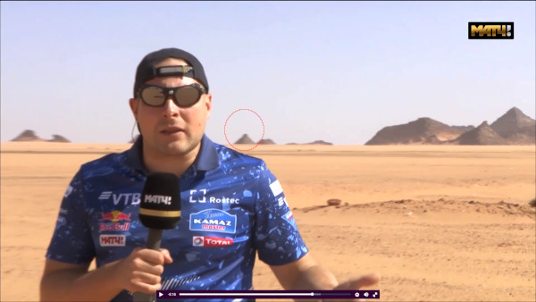 another pyramids behind the reporter